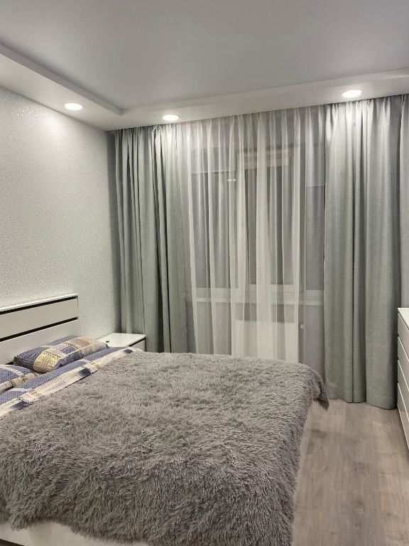 Апартаменты Современная студия с отдельной спальней с видом на Versal Park Ирпень